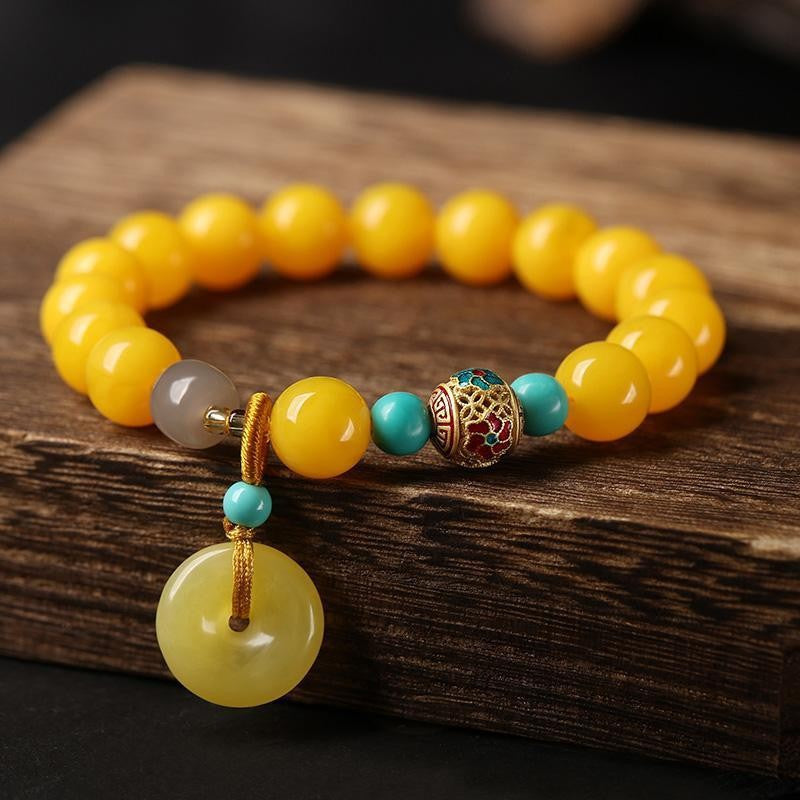 Amber and Red Agate Safety Knot Bracelet – Handmade Energy Jewelry for Peace, Protection, and Balance.