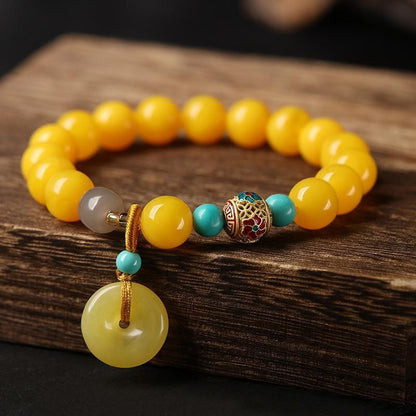 Amber and Red Agate Safety Knot Bracelet – Handmade Energy Jewelry for Peace, Protection, and Balance.